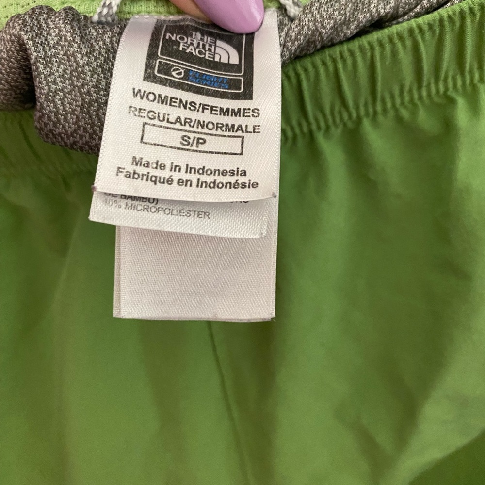 The North Face green athletic shorts. Size small.
